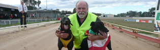 Peter Riley with celebrity greyhound Fred Bassett & VBISRace 8 VBIS distance series winner Which Wabbit